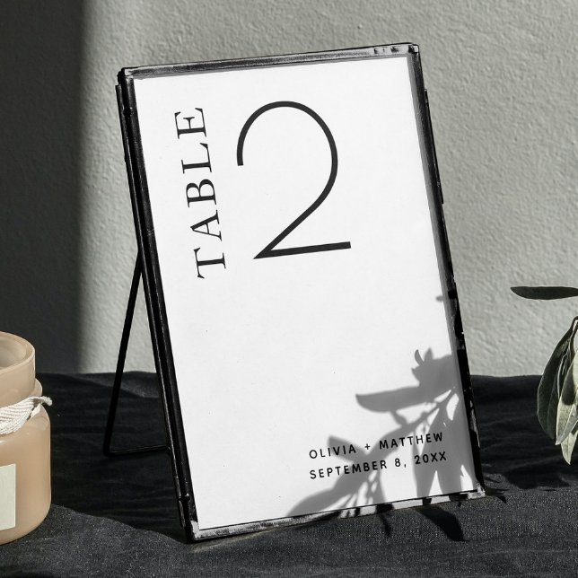 Black and white simple clean minimalist wedding table number (Creator Uploaded)