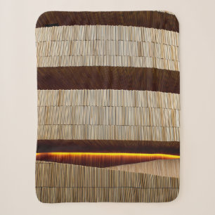 Black and white striped textile sherpa blanket