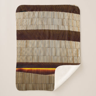 Black and white striped textile sherpa blanket