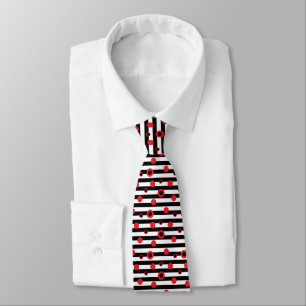 Black-and-white stripes and red circles pattern tie