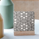 Black and White Symmetrical Geometric Mosaic Tile<br><div class="desc">This ceramic tile has a stunning geometric design that is both detailed and symmetrical. The monochromatic style incorporates strong, black lines that weave and connect to form a succession of captivating patterns. Each component of the design features a distinct pattern that adds visual appeal. The designs are symmetrical, with detailed...</div>