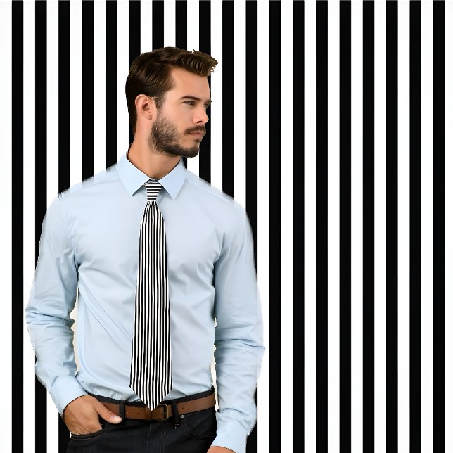 Black and White Thin Vertical Stripes Tie (Man wearing a necktie with vertical black and white stripes standing against wall with same pattern.)