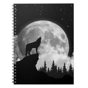 Black and white wolf howling at the moon notebook