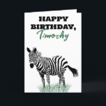Black and White Zebra in the Grass Birthday Card<br><div class="desc">All the text on the front and the inside of this greeting card can be customised so you can create the perfect personalised card for any occasion. The front features a realistic style illustration of a black and white zebra standing in some green grass.</div>