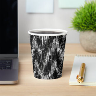 Black-and-white zigzag strokes paper cups