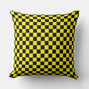 Black and yellow chequered board pattern cushion