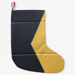 Black and yellow paint wall small christmas stocking