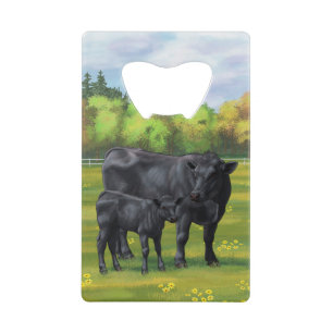 Black Angus Cow & Cute Calf in Summer Pasture