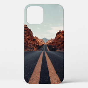 BLACK ASPHALT ROAD BETWEEN BROWN ROCK FORMATION UN iPhone 12 CASE