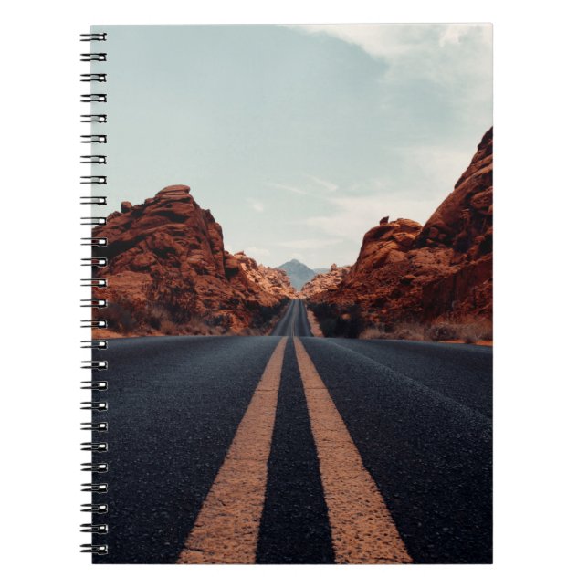 BLACK ASPHALT ROAD BETWEEN BROWN ROCK FORMATION UN NOTEBOOK (Front)