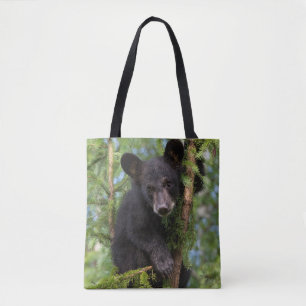 Black Bear Cub Playing in Trees Tote Bag