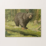 Black Bear Stepping on a Tree Trunk Jigsaw Puzzle<br><div class="desc">This fine art print by Oliver Kemp illustrates a brown bear stepping on a fallen tree in a forest. The pastel green colours are calming for the eye and create a nice warm feeling of the awakening nature in the spring. A great addition to any rustic home decor!</div>