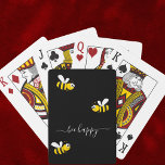 Black bee happy bumble bees summer fun humour playing cards<br><div class="desc">Decorated with happy,  smiling yellow and black  bumblebees. A chic black background. White hand lettered script and the text: Bee Happy</div>