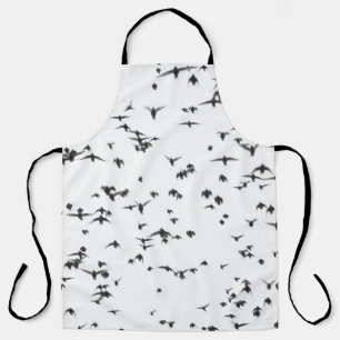 BLACK BIRDS FLYING ON SKY APRON