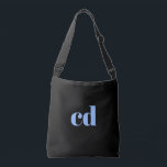 Black blue monogram initials elegant modern crossbody bag<br><div class="desc">A classic chic black background. Personalise and add your monogram initials written with light blue block letters. Modern,  trendy and simple.</div>