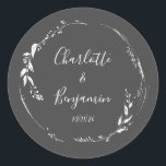Black Botanical Personalised Script Wedding Names  Classic Round Sticker<br><div class="desc">Dusty Black and White Floral Wreath Monogram Personalised Names and Wedding Date Script Calligraphy Classic Round Sticker</div>