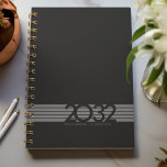 Black Bottom Stripe Spiral Weekly Planner<br><div class="desc">Simple personal stationery 2025  annual/weekly planner with year made of horizontal stripes and overlapping numbers. Annual planner (12 months) with open monthly overviews and weekly planning sheets. Cover in a curated selection of modern colours. Contact for assistance in personalising or creating special colour combination.</div>