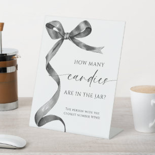 Black Bow How Many Candies Are In The Jar  Pedestal Sign