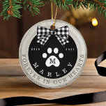 Black Bow Paw Print Memorial Pet Photo Wood Slice Ceramic Tree Decoration<br><div class="desc">Rustic pet memorial photo ornament featuring a rustic faux birch wood slice background decorated with a buffalo black and white plaid bow and white paw print. Customize with your pet's name , year born, year passed and monogram. The reverse side features a place to add your pet's photo. Designed by...</div>