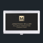 Black Brushed Gold Monogram Business Card Holder<br><div class="desc">Elevate your professional look with this stylish and practical business card case. Featuring a brushed monogram medallion with your name company and title in classic block typography, this case is a great way to keep your business cards organised and protected. The sleek black background adds a touch of sophistication, while...</div>