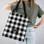 Black Buffalo Plaid Pattern Monogrammed Bridesmaid Tote Bag<br><div class="desc">This black buffalo plaid pattern monogrammed bridesmaid tote bag is the perfect gift for her. The design features a classic black and white buffalo plaid pattern.  Personalise the bag with her first or last name.</div>