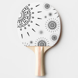 Black Burst Patterns on White Ping Pong Paddle