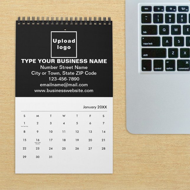 Black Business Brand on Calendar (Build brand name awareness. Black business branding on calendar displayed on office desk.)