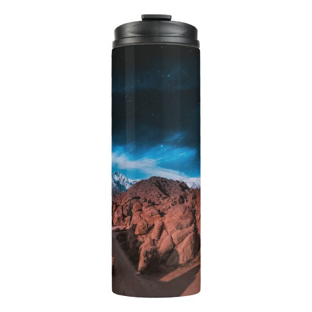 BLACK CAR NEAR ROCK FORMATIONS THERMAL TUMBLER (Front)