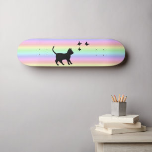 Black Cat and Butterfly on Rainbow Skateboard