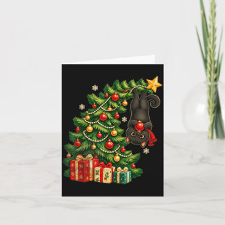Black cat hanging from christmas tree festive pet card