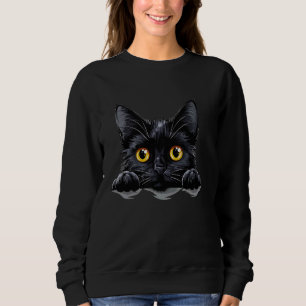 Black cat illustration with paws peeking out sweatshirt