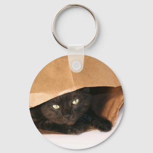 Black cat in a bag keychain