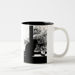 Black cat in window Two-Tone coffee mug