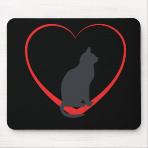 Black cat on red open heart, black background mouse mat