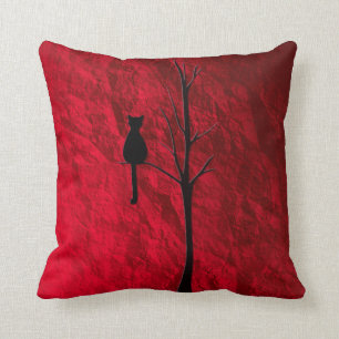 black cat on tree throw pillow