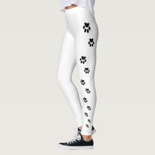 Black cat paw prints on white leggings