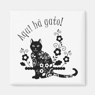 Black cat with flowers and Portuguese expression Magnet