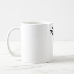 Black cat with green eyes coffee mug