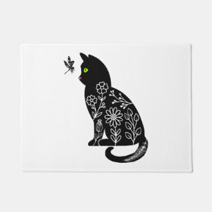 Black cat with green eyes doormat