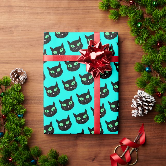 Black cat with green eyes on turquoise blue wrapping paper (Holiday Gift)