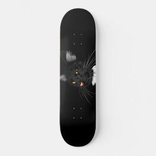 Black cat with yellow eyes in the dark skateboard