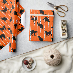 Black Cats and Birch Branches on Vibrant Orange Wrapping Paper