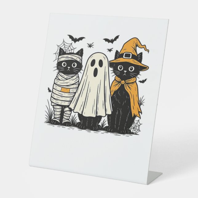 Black Cats in Halloween Costumes – Ghost, Witch, a Pedestal Sign (Front)