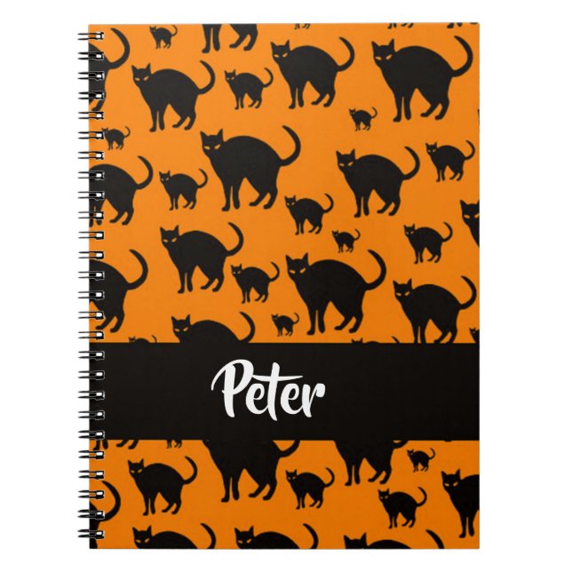 Black cats on orange notebook (Front)