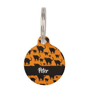 Black cats on orange pet tag