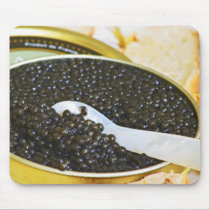 Black caviar and a spoon of mother-of-pearl to mouse mat