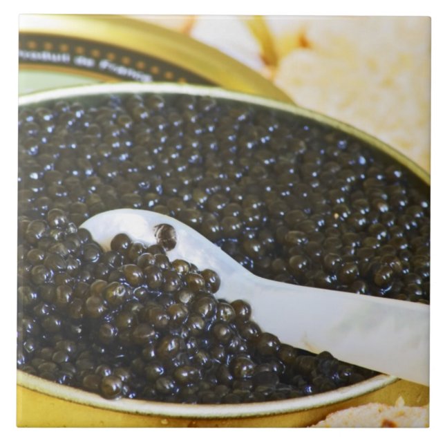 Black caviar and a spoon of mother-of-pearl to tile (Front)