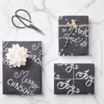 Black Chalkboard White Script Merry Christmas Wrapping Paper Sheet<br><div class="desc">Black chalkboard background,  white script. Simple,  minimalistic, ,  Modern Black & White design with "Merry Christmas" 'Joy" and "Magic time" script calligraphy. Art and design by Katalin Bator-Hos @BHKatti</div>