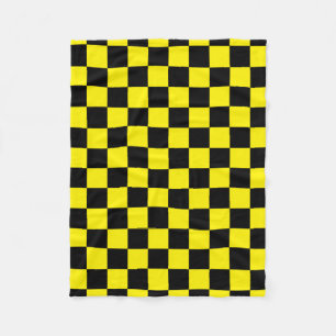 Black checkers on yellow fleece blanket