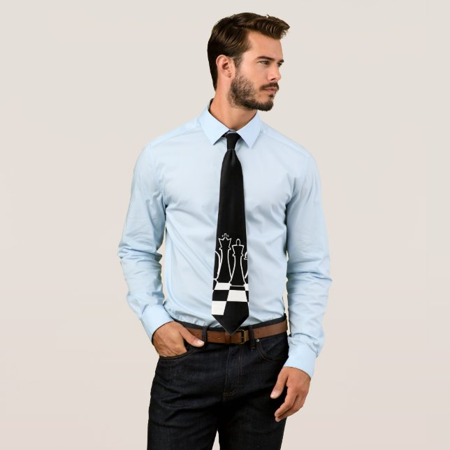 Black chess pieces on a chessboard tie (In Situ)